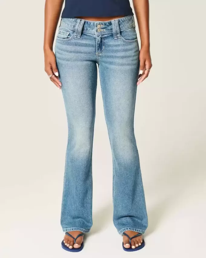 Blugi bootcut cu talie joasă, cu spălare medie, cu flori brodate Blugi bootcut cu talie joasă, cu spălare medie, cu flori brodate
