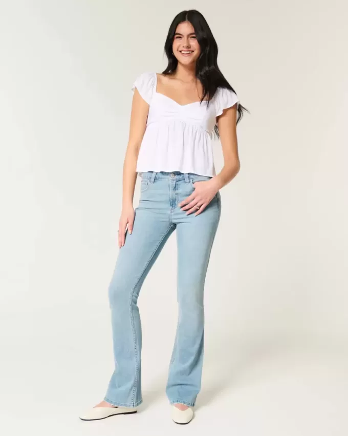 Blugi bootcut cu talie medie, cu spalare usoara Blugi bootcut cu talie medie, cu spalare usoara