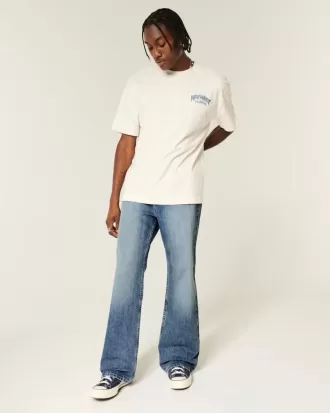 Blugi bootcut largi cu spalare medie