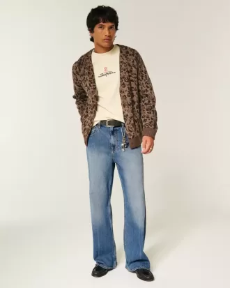 Blugi bootcut largi cu spalare medie
