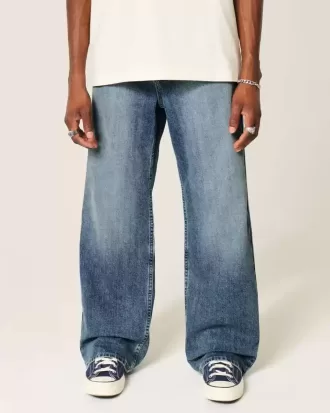 Blugi bootcut largi cu spalare medie