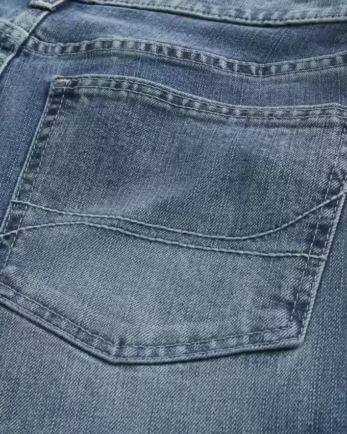 Blugi bootcut largi cu spalare medie Blugi bootcut largi cu spalare medie