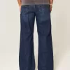 Blugi bootcut largi la culoare închisă Blugi bootcut largi la culoare închisă