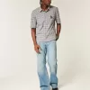 Blugi bootcut relaxați cu spălare medie Blugi bootcut relaxați cu spălare medie