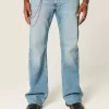 Blugi bootcut relaxați cu spălare medie Blugi bootcut relaxați cu spălare medie