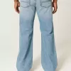 Blugi bootcut relaxați cu spălare medie Blugi bootcut relaxați cu spălare medie