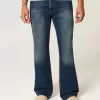 Blugi bootcut relaxați cu spălare închisă Blugi bootcut relaxați cu spălare închisă