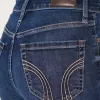 Blugi evazați cu talie înaltă, rupti, spalat la culoare închisă Blugi evazați cu talie înaltă, rupti, spalat la culoare închisă