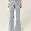 Blugi flare cu talie mare cu spalare medie Blugi flare cu talie mare cu spalare medie