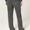 Blugi largi cu logo negru spalat Blugi largi cu logo negru spalat