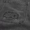 Blugi largi cu logo negru spalat Blugi largi cu logo negru spalat
