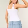 Blugi largi, cu talie joasă, cu spălare medie, cu broderie florală Blugi largi, cu talie joasă, cu spălare medie, cu broderie florală