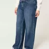 Blugi largi, cu talie mijlocie, de culoare închisă