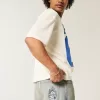 Blugi largi skater cu zaruri brodate cu spalare usoara Blugi largi skater cu zaruri brodate cu spalare usoara