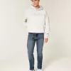 Blugi skinny atletici cu spalare medie Blugi skinny atletici cu spalare medie