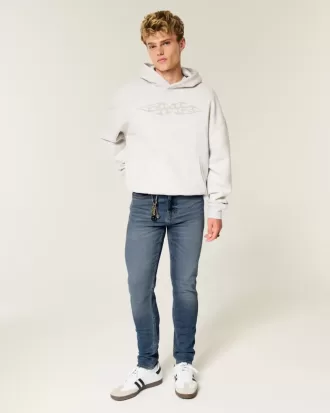 Blugi skinny atletici cu spalare medie