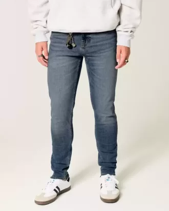 Blugi skinny atletici cu spalare medie