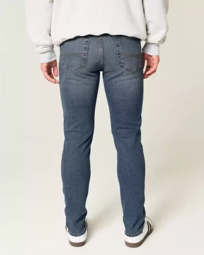 Blugi skinny atletici cu spalare medie Blugi skinny atletici cu spalare medie