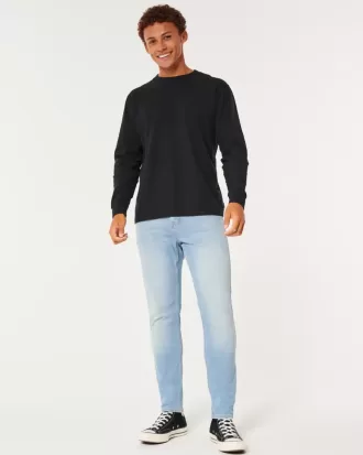 Blugi skinny atletici cu spalare usoara