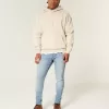 Blugi skinny atletici cu spalare usoara Blugi skinny atletici cu spalare usoara