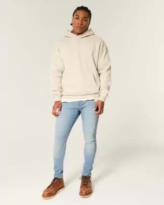 Blugi skinny atletici cu spalare usoara