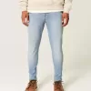 Blugi skinny atletici cu spalare usoara Blugi skinny atletici cu spalare usoara