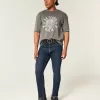 Blugi skinny atletici de culoare închisă Blugi skinny atletici de culoare închisă