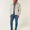 Blugi skinny atletici de culoare închisă Blugi skinny atletici de culoare închisă
