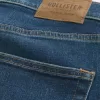 Blugi skinny atletici de culoare închisă Blugi skinny atletici de culoare închisă