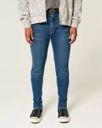 Blugi skinny atletici de culoare închisă