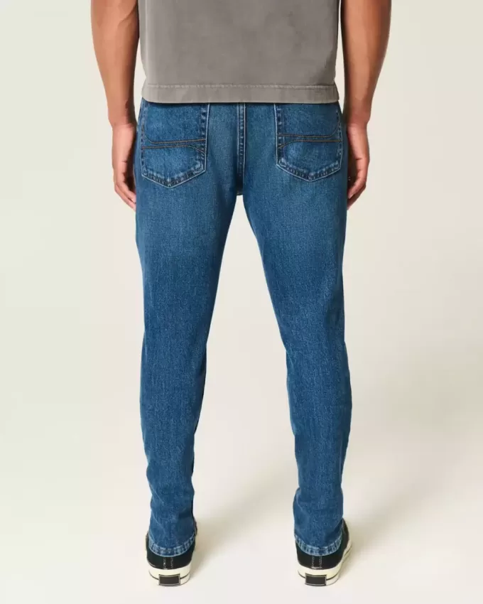 Blugi skinny atletici de culoare închisă Blugi skinny atletici de culoare închisă