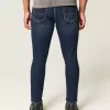 Blugi skinny atletici de culoare închisă Blugi skinny atletici de culoare închisă