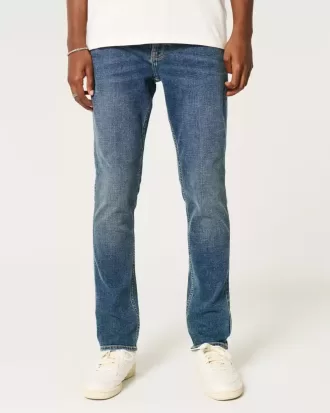 Blugi skinny cu spalare medie închisă