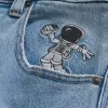 Blugi super largi cu astronaut cu spalare ușoară Blugi super largi cu astronaut cu spalare ușoară