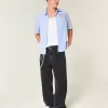 Blugi super largi cu stea neagră, spălați Blugi super largi cu stea neagră, spălați