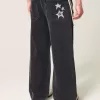 Blugi super largi cu stea neagră, spălați Blugi super largi cu stea neagră, spălați