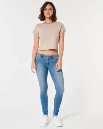 Blugi super skinny, cu talie joasă, cu spalare medie