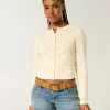 Cardigan cu ochiuri Cardigan cu ochiuri