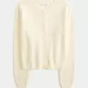 Cardigan cu ochiuri Cardigan cu ochiuri