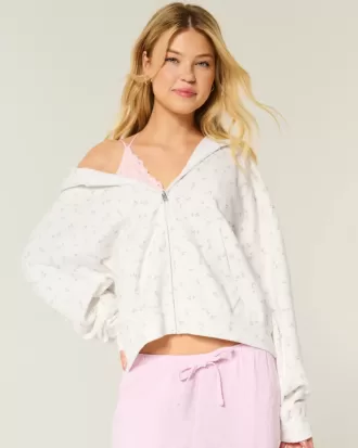 Hanorac supradimensionat cu fermoar cu model floral