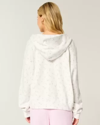 Hanorac supradimensionat cu fermoar cu model floral