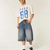 Jumătate de pantaloni din denim cu spălare medie Jumătate de pantaloni din denim cu spălare medie