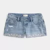 Mini pantaloni scurți din denim brodat cu talie foarte joasă Mini pantaloni scurți din denim brodat cu talie foarte joasă