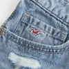 Mini pantaloni scurți din denim brodat cu talie foarte joasă Mini pantaloni scurți din denim brodat cu talie foarte joasă
