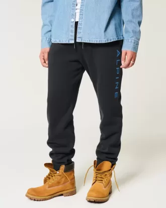 Pantaloni de jogging relaxați din lână alpină cu grafică Pantaloni de jogging relaxați din lână alpină cu grafică