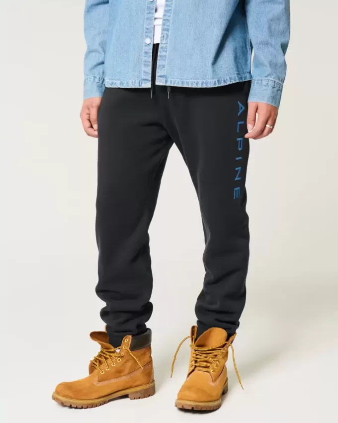 Pantaloni de jogging relaxați din lână alpină cu grafică Pantaloni de jogging relaxați din lână alpină cu grafică