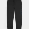 Pantaloni de jogging relaxați din lână alpină cu grafică Pantaloni de jogging relaxați din lână alpină cu grafică