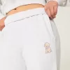 Pantaloni de sport cu picioare largi cu grafic pentru câini Pantaloni de sport cu picioare largi cu grafic pentru câini