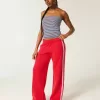 Pantaloni de sport cu picioare largi în dungi Pantaloni de sport cu picioare largi în dungi