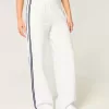 Pantaloni de sport cu picioare largi în dungi Pantaloni de sport cu picioare largi în dungi